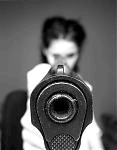Woman aiming a pistol