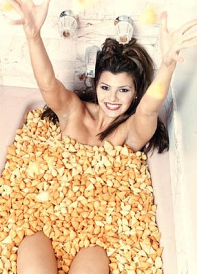 Girl in bathtub full of chips
